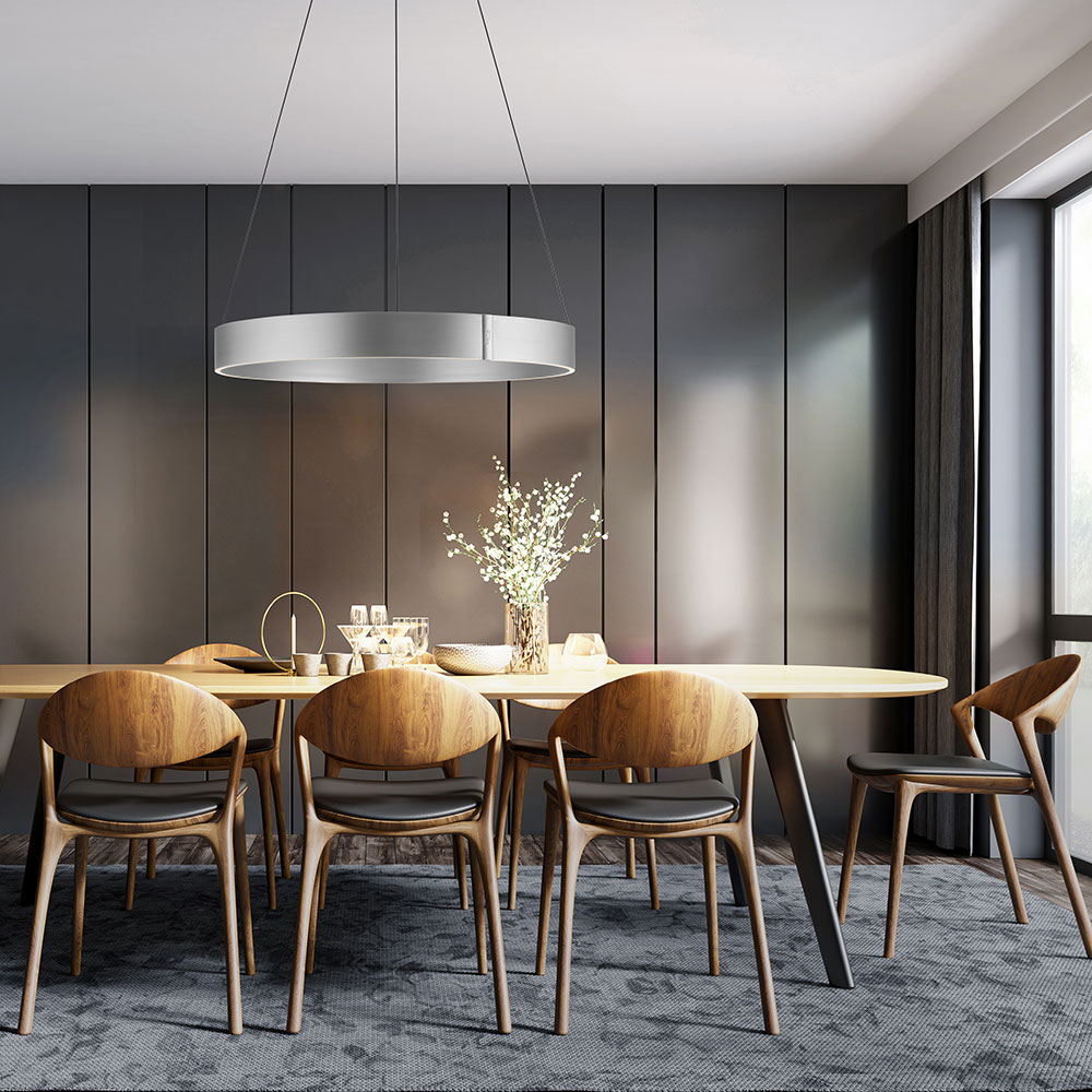 Vielseitige Einsatzmöglichkeiten der Pure Clipse Pendelleuchten – ideal für runde und rechteckige Tische sowie repräsentative Räume Pure Clipse Pendelleuchten über rundem und rechteckigem Tisch installiert – flexible Beleuchtungslösung für Essbereiche, Büros, Treppenhäuser und Galerien